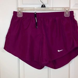 Purple Nike Dri-Fit running shorts